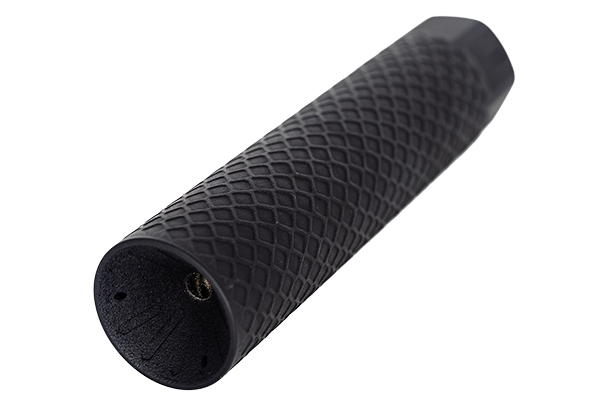 Angled product image of the Off Grid Suppressors Trident TI titanium suppressor with a black diamond-pattern textured finish, recessed front cap, and hex-shaped rear section on a white background.